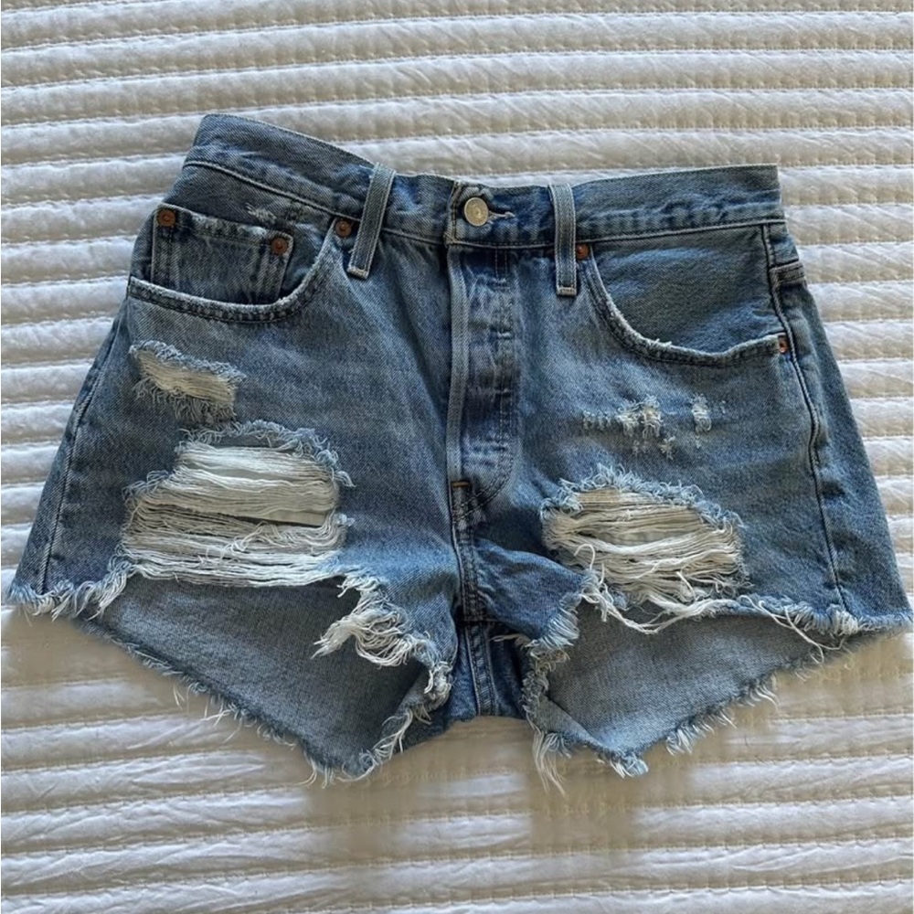 Levi's Blue Jean Shorts with High-Waisted Design and Distressed Details